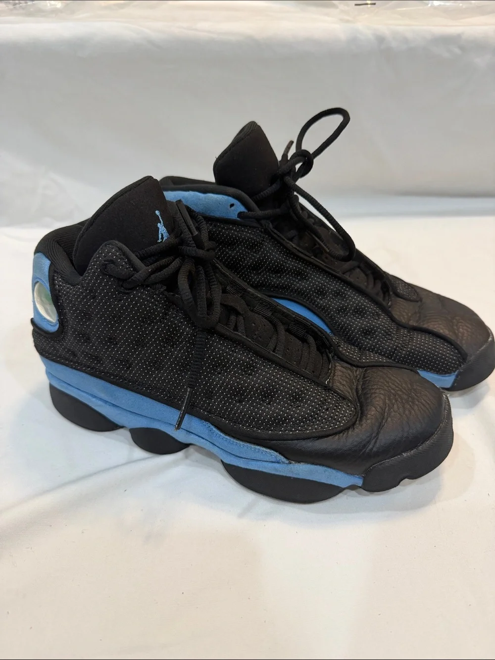Jordan Men's Black and University Blue Retro Sneakers